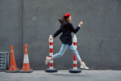 Low section of man standing on street