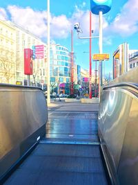 View of street in city against sky