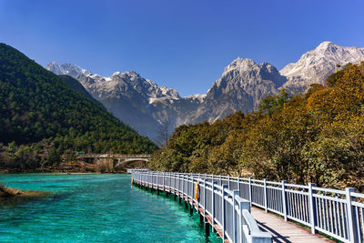 Scenic view of mountain against blue sky