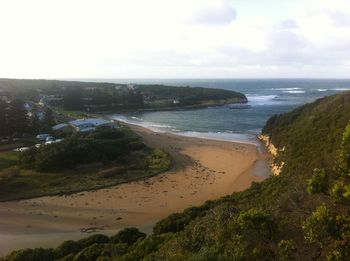 Scenic view of beach against sky