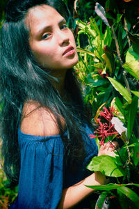 Portrait of woman in plant