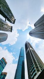 Low angle view of skyscraper against sky