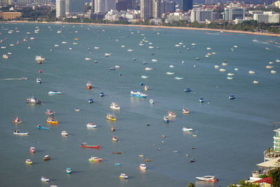 High angle view of city by sea