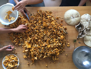 High angle view of person preparing food on table