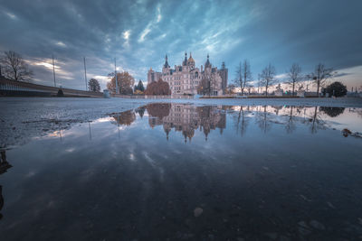 Reflection of buildings in lake