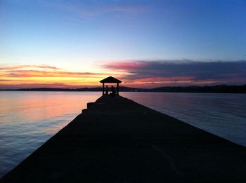 View of pier at sunset