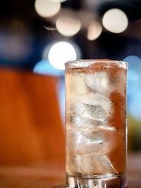 Close-up of beer glass on table