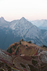 High angle view of snowcapped mountains against clear sky