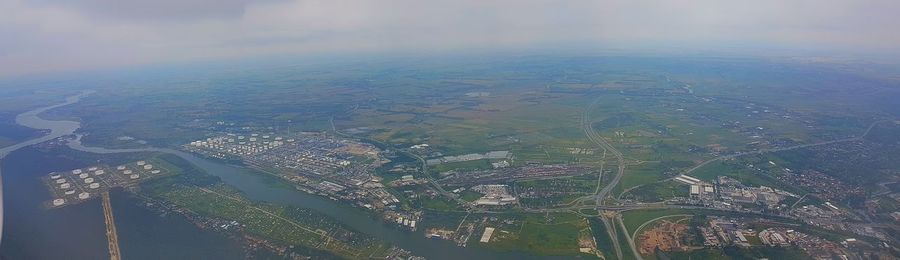 Aerial view of cityscape against sky