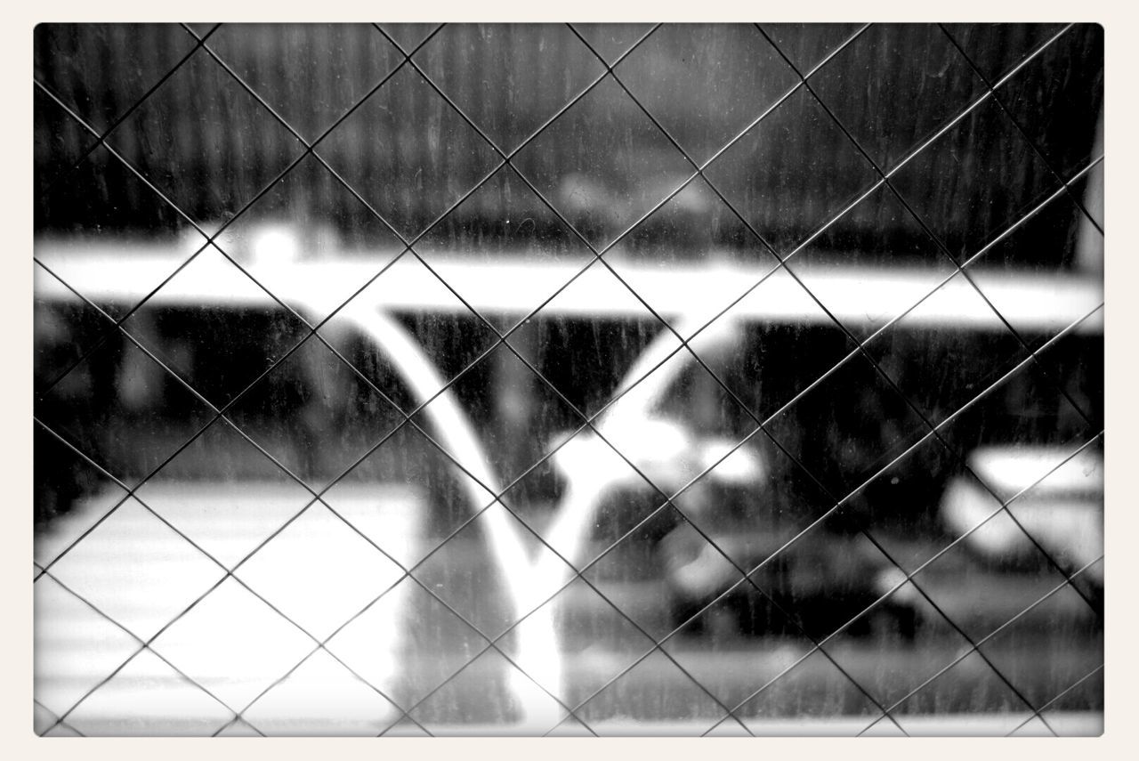 full frame, backgrounds, fence, chainlink fence, pattern, protection, safety, metal grate, window, metal, close-up, indoors, security, focus on foreground, transfer print, day, design, no people, auto post production filter, metallic