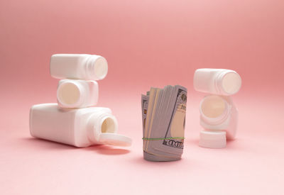 High angle view of bottles against yellow background