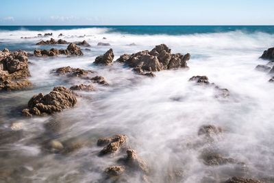 Scenic view of rocky shore