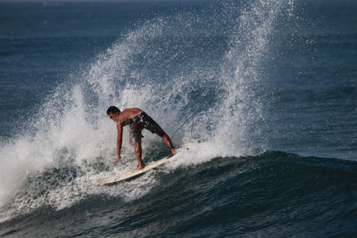 Man surfing in sea