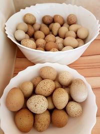 High angle view of eggs in bowl on table