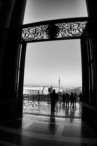 People in corridor of building