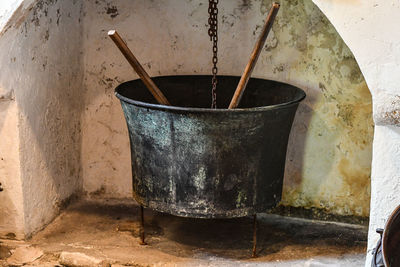 Close-up of old tea hanging on wall