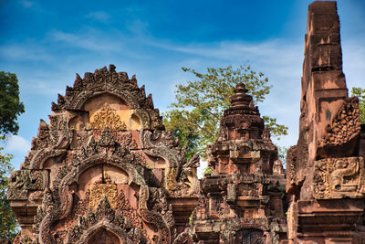 Low angle view of temple against building