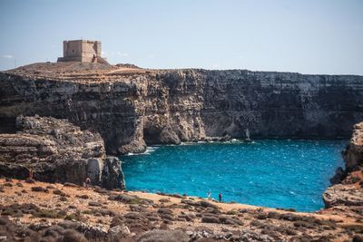 View of cliff by sea