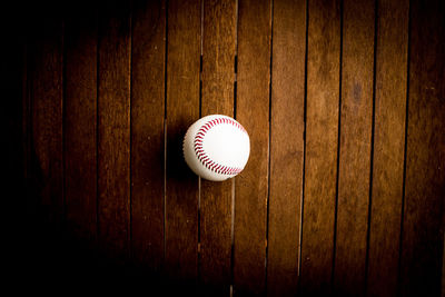 Directly above shot of ball on wooden table