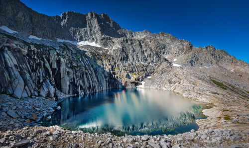 View of precipice lake  against the sky