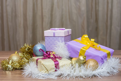 Close-up of christmas present on table