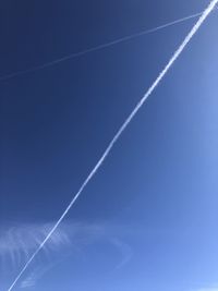 Low angle view of vapor trail in sky