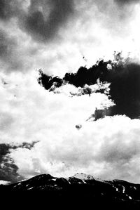 Low angle view of silhouette tree against sky