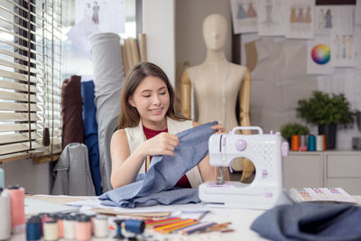 Young woman working at home