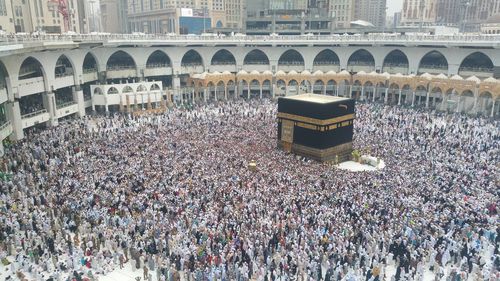 High angle view of people on bridge in city