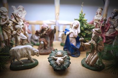 Close-up of christmas figurines on table