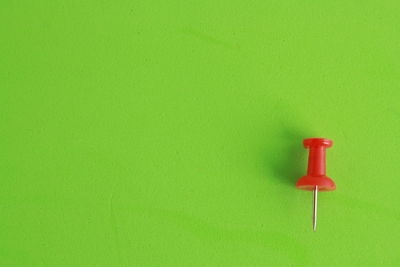 Directly above shot of green table against wall