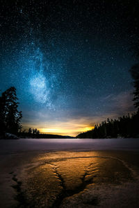 Scenic view of sea against sky at night