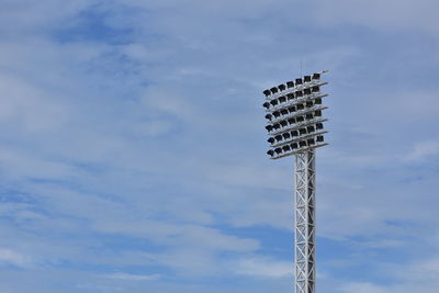 Low angle view of communications tower against sky