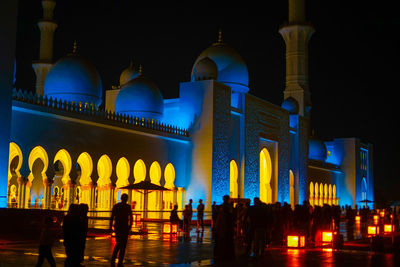 Rear view of silhouette people at night