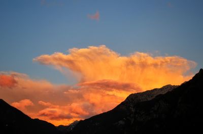 Low angle view of mountain against sky during sunset