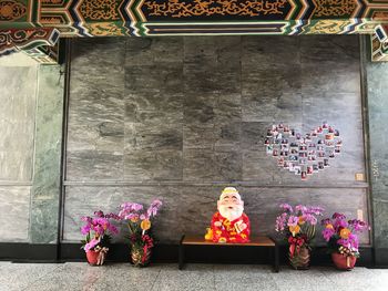 Various flowers on wall at temple