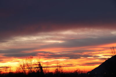 Scenic view of dramatic sky during sunset