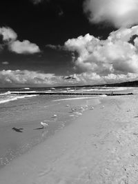 Scenic view of beach against sky