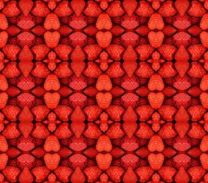 Seamless abstract pattern of red raspberries . kaleidoscopic background design.