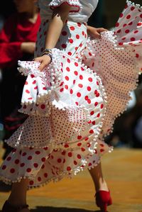 Low section of woman performing flamenco