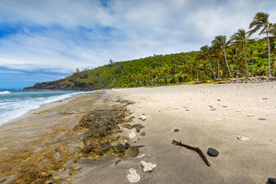 Scenic view of beach against sky