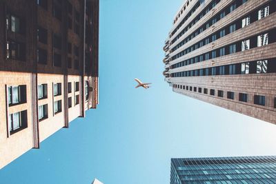 Low angle view of buildings against clear sky