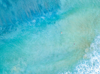 High angle view of people swimming in pool