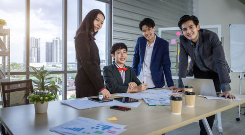 Group of people working on table