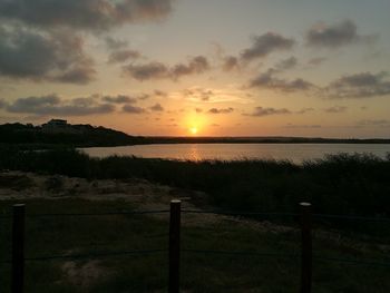 Scenic view of sea against sky during sunset