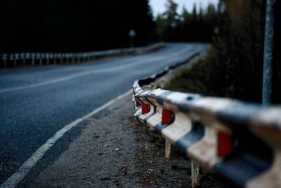 Close-up of car on road