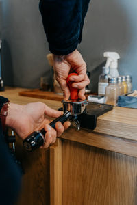 Close-up of man working on table