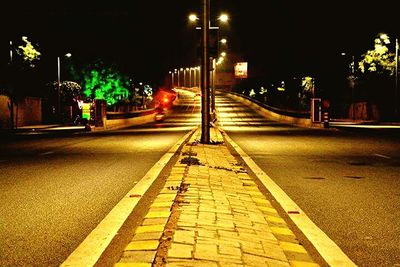 Illuminated street lights at night