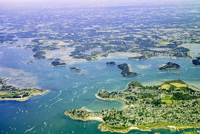 High angle view of sea and cityscape