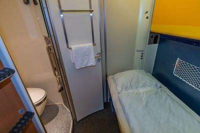 High angle view of empty bed in train